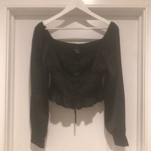 Forever 21. Medium black long sleeve silk feel material.